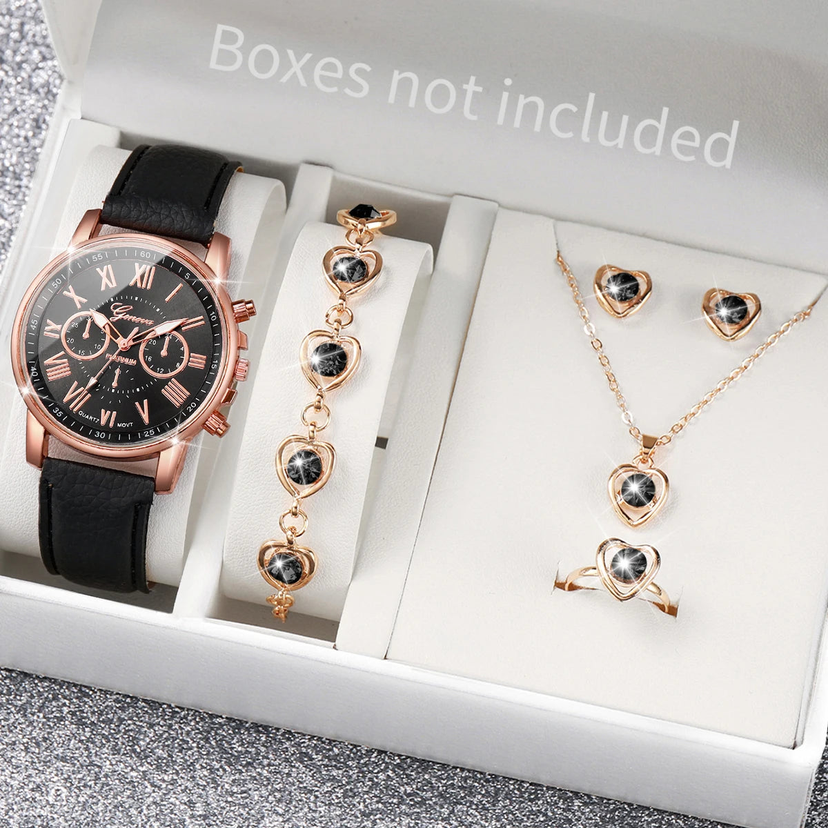 Wakefresh women's quartz wristwatch with leather band and rhinestone accents, paired with matching heart jewelry set on a neutral background.