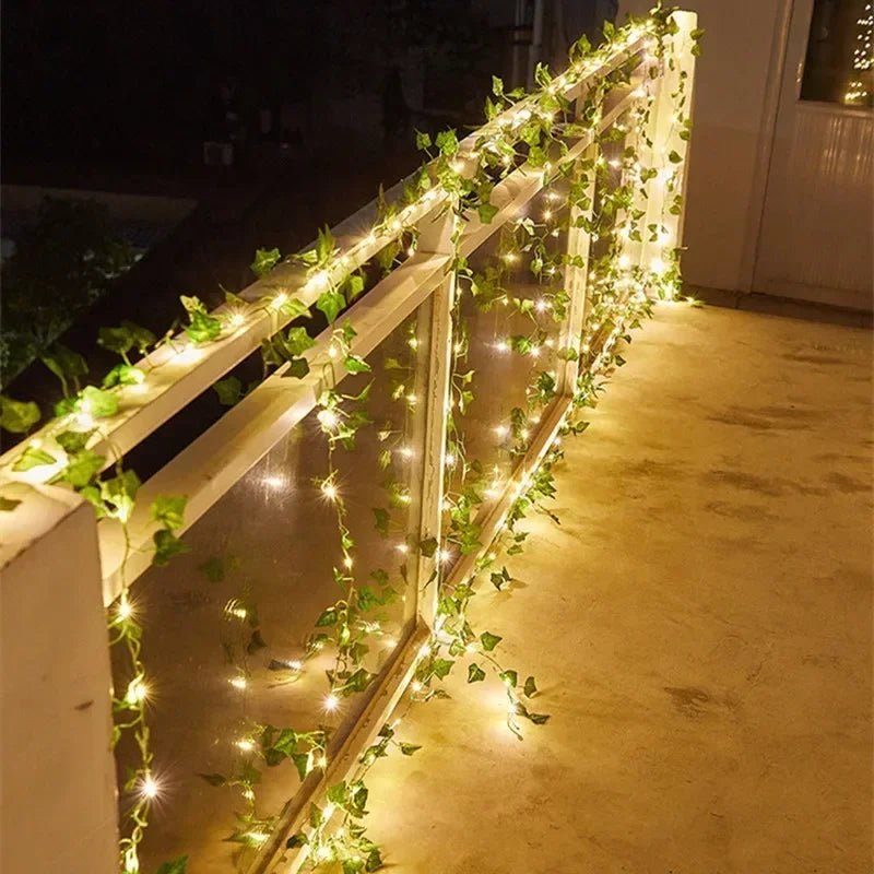 Wakefresh green leaf string lights with 20 LED flower and vine decorations, battery-powered for Christmas or home decor.