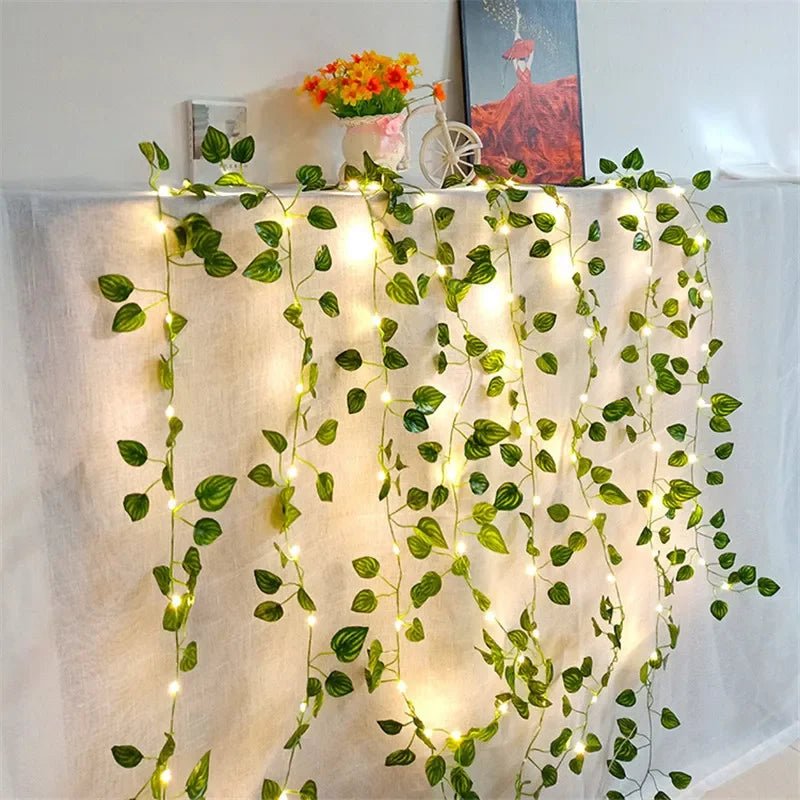 Wakefresh green leaf string lights with 20 LED fairy lights on an artificial vine for Christmas, wedding, or home decor.