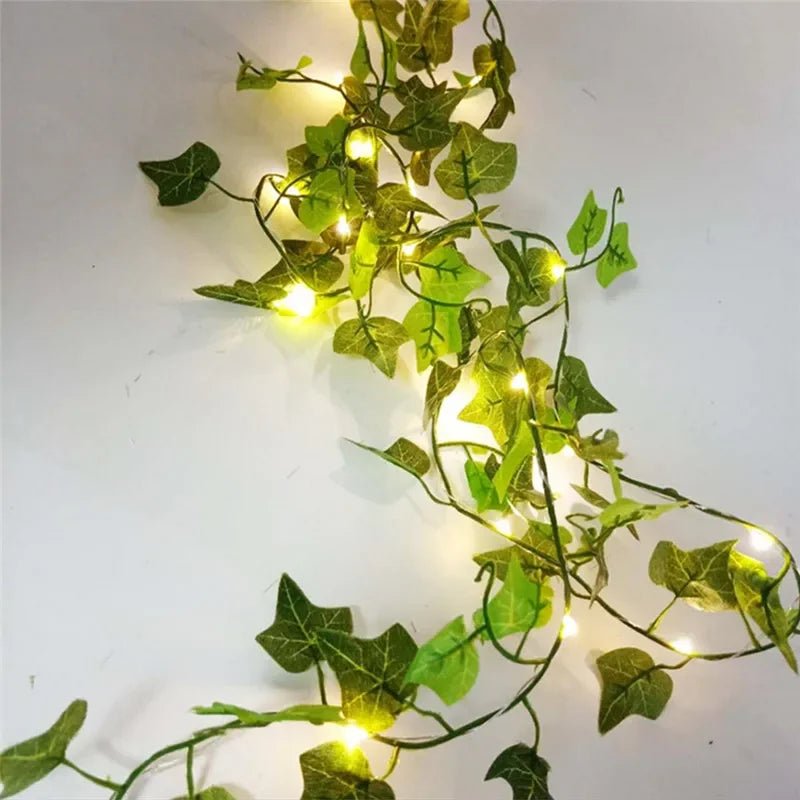 Wakefresh green leaf string lights with 20 LED flowers and vines, battery-powered fairy lights for Christmas, wedding, or home decor.